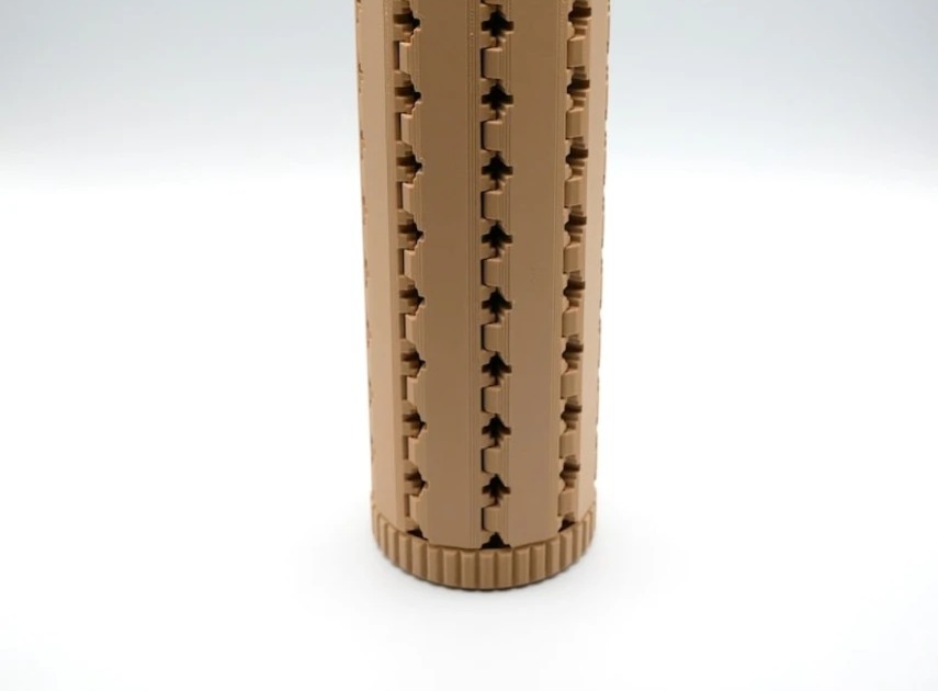 The board rolled and closed into its ridged screw-top tube, standing upright